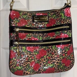 Betsy Johnson Leopard print sparkly shoulder bag.